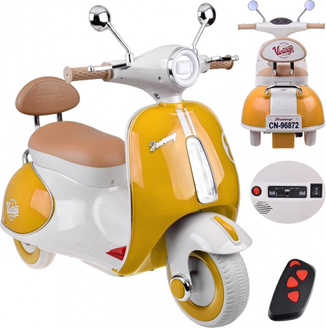 Klassischer elektrischer Kinderscooter orange – Grün