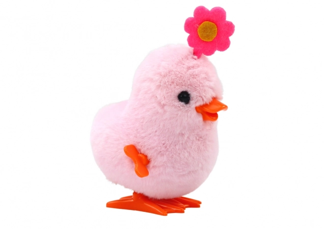 Niedlicher aufziehbarer Hüpfhühnchen mit Blume