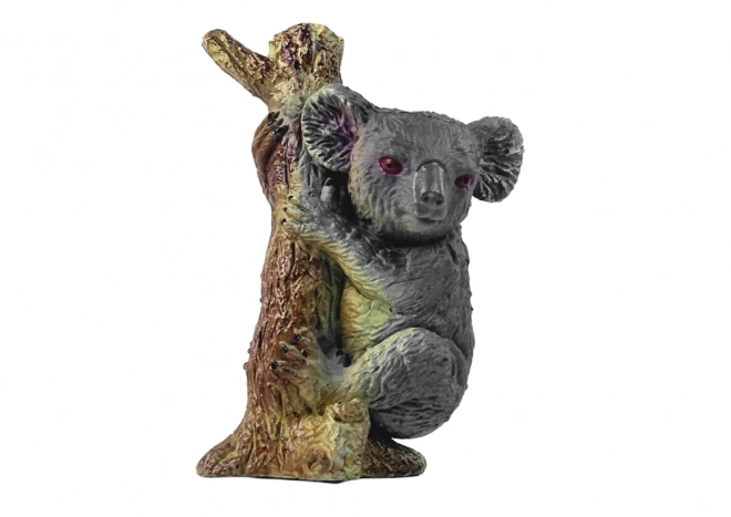 Koala-Figur auf einem Baum