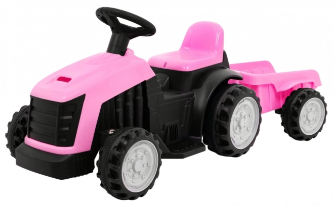 Grüner Traktor mit Anhänger – rosa