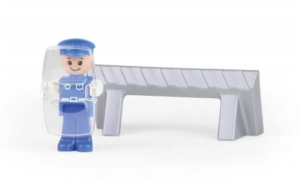 Polizistenfigur und Absperrung