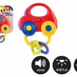 Rassel in Autoform mit Licht und Sound, Kunststoff, 10 × 11 cm, batteriebetrieben, 3m+