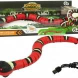 Interaktive, berührungsgesteuerte Schlange, rot mit schwarzen Streifen