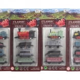 Set aus Metall-Eisenbahnen mit Lokomotive und drei Waggons